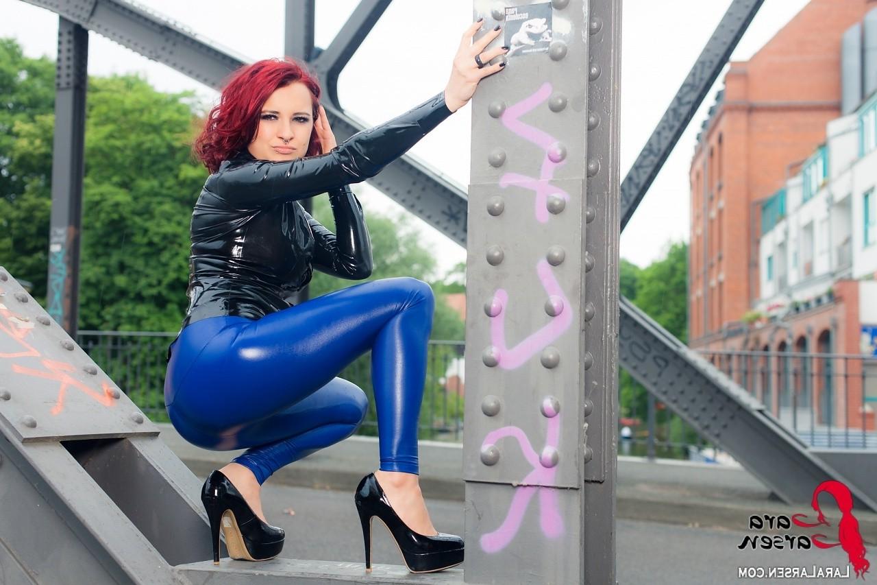 12P Redhead in shiny latex