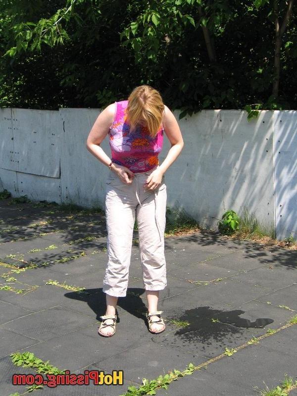 15P Slutty blond in the pants demonstrates her boobs after public pissing
