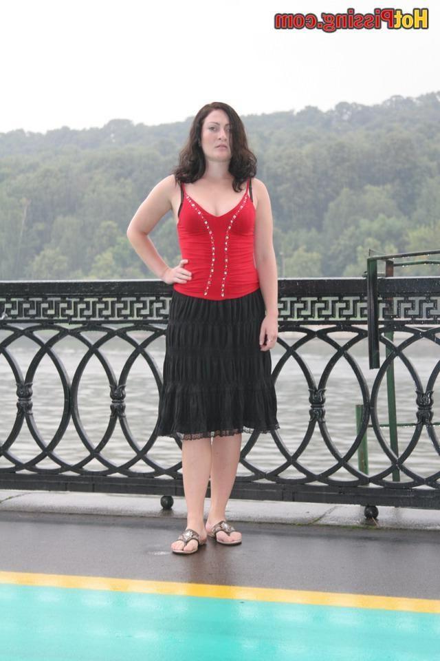 15P Fatty lady is not shy to let hot pissing flow into cold river water