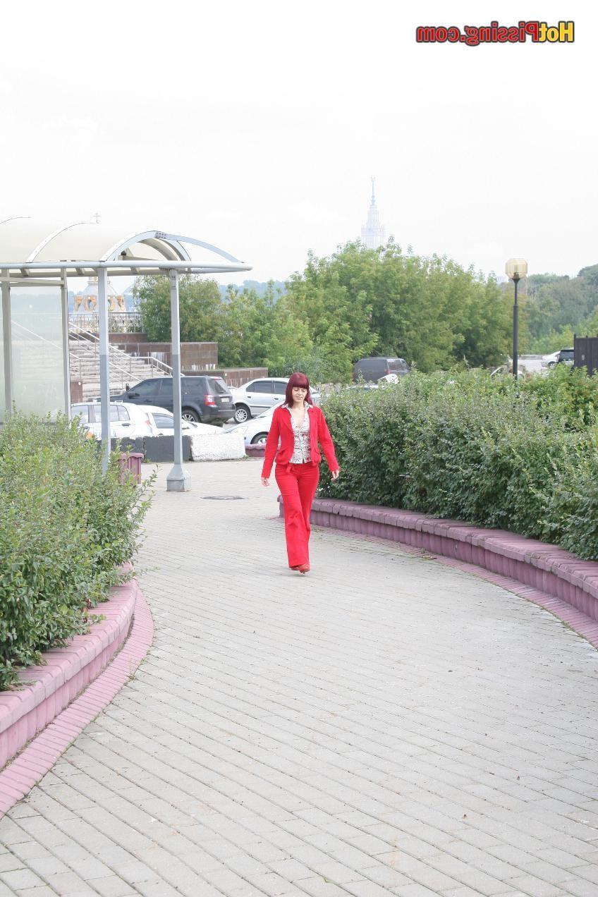 15P Young lady is pissing hot next to the yard garden near green bushes