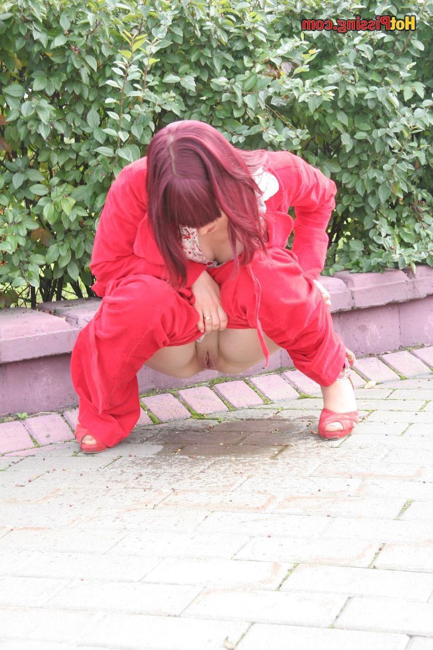 15P Young lady is pissing hot next to the yard garden near green bushes