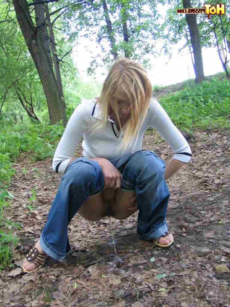 16P Slut pissing in the woods and using a leaf to wipe her pussy