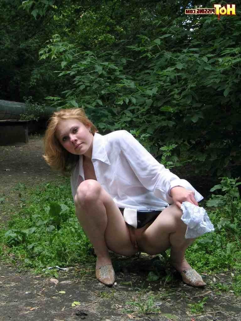 16P Cutie pissing outdoors