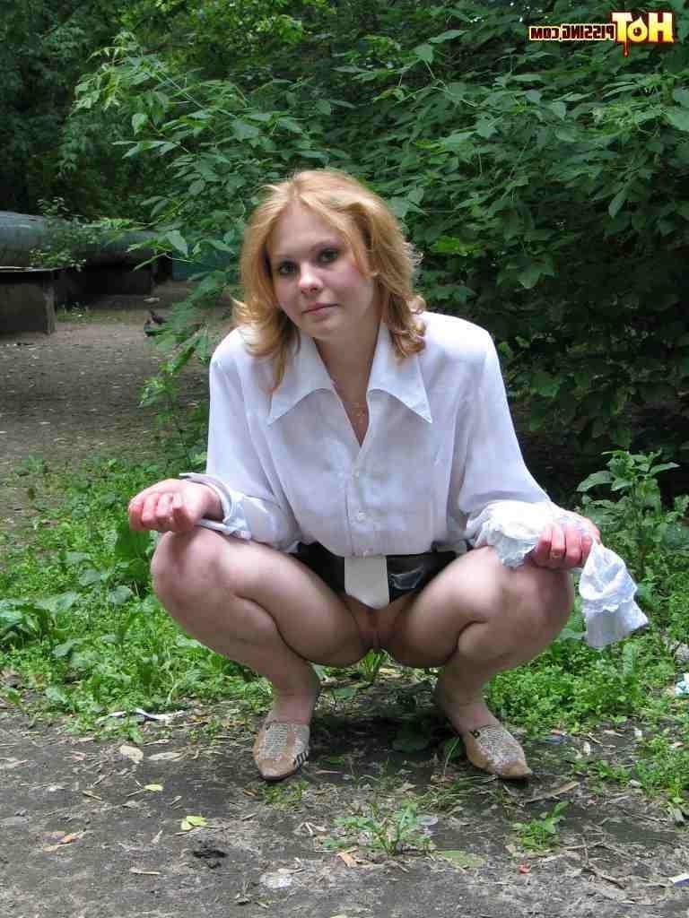 16P Cutie pissing outdoors