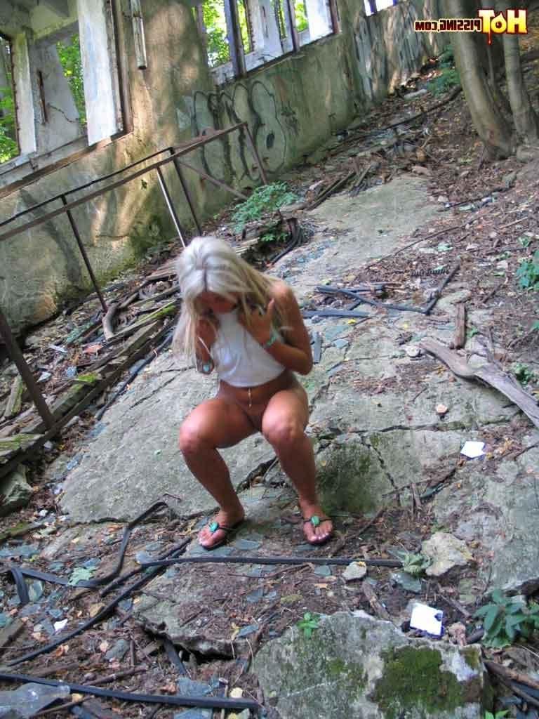 16P Sexy slut pissing outdoors