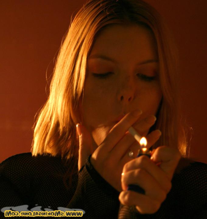 16P Horny smoker rubs her clit while she smokes