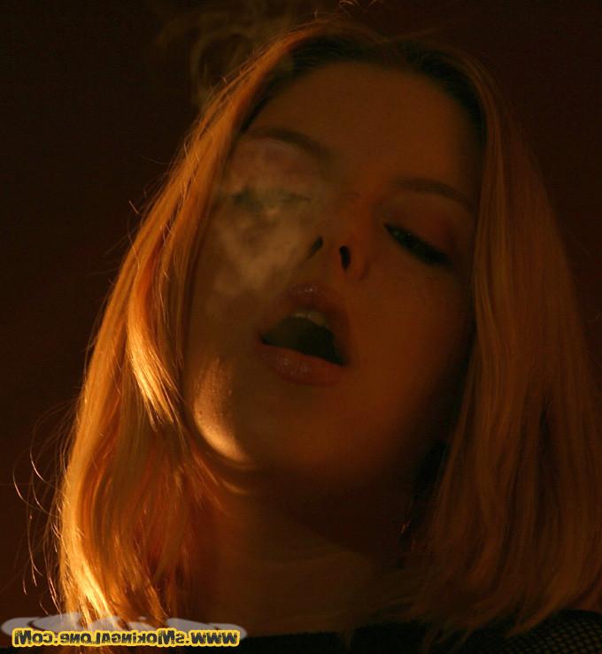16P Horny smoker rubs her clit while she smokes