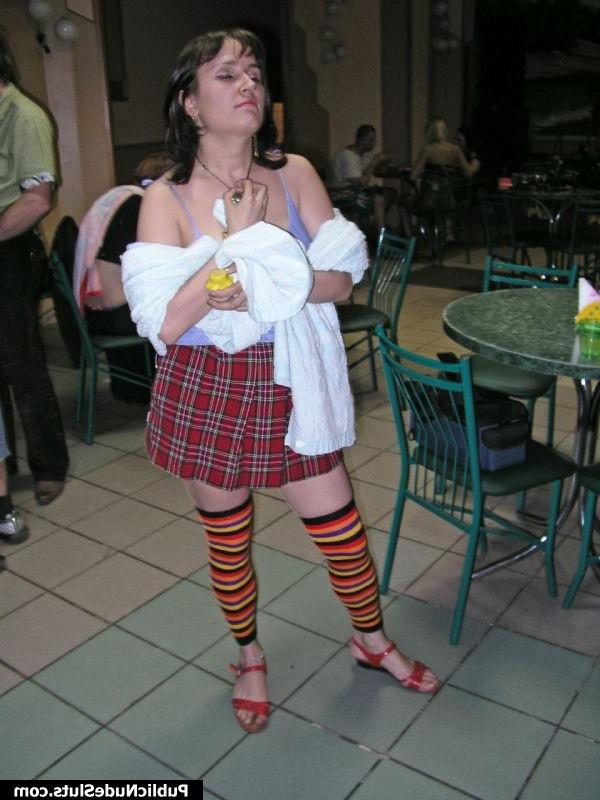 15P Yummy sexpot shocking the cafe visitors with her nude boobs and butt