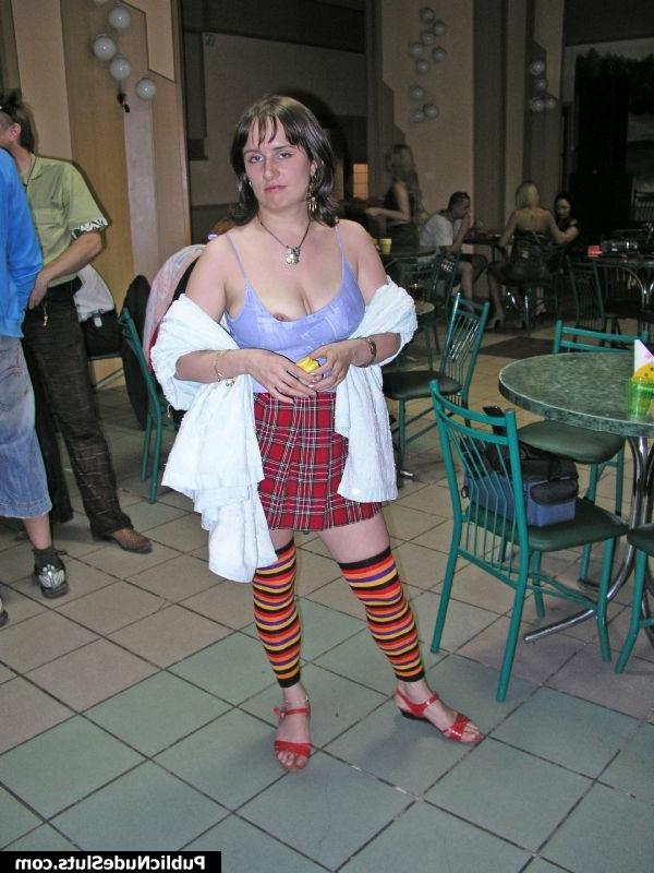 15P Yummy sexpot shocking the cafe visitors with her nude boobs and butt