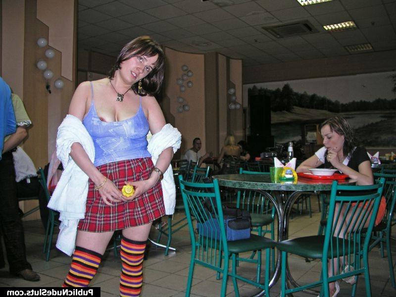 15P Yummy sexpot shocking the cafe visitors with her nude boobs and butt