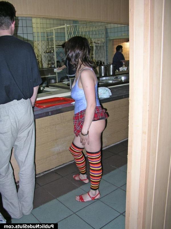 15P Yummy sexpot shocking the cafe visitors with her nude boobs and butt