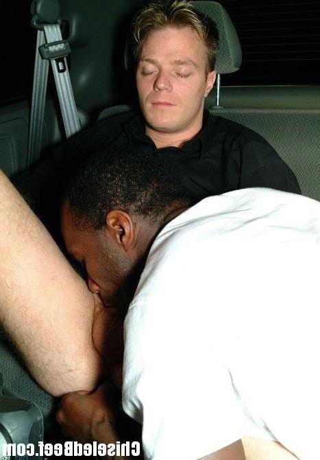 12P A black and a white guy in sucking action inside the van