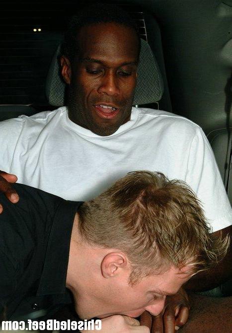 12P A black and a white guy in sucking action inside the van