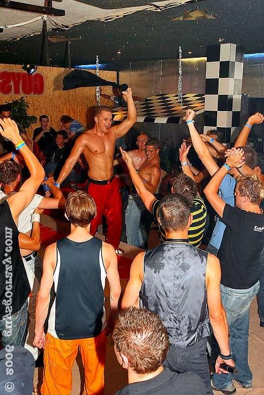 20P Gay guys fighting for a taste of malestrippers dick at an orgy