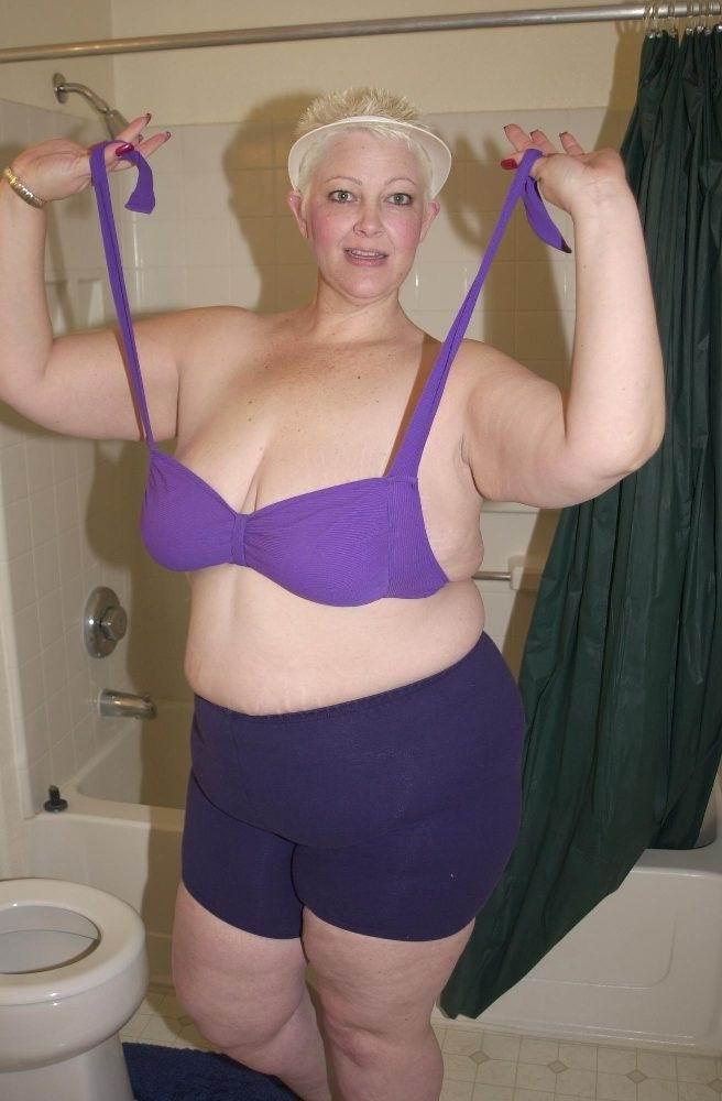 14P playfull amateur granny licking her huge tits
