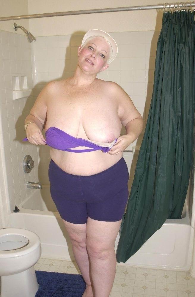 14P playfull amateur granny licking her huge tits