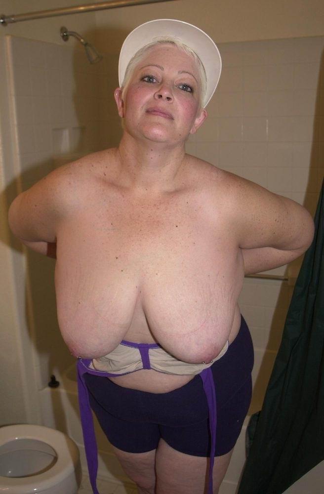 14P playfull amateur granny licking her huge tits