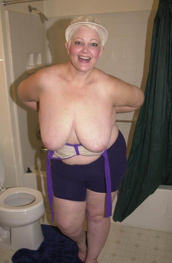 14P playfull amateur granny licking her huge tits