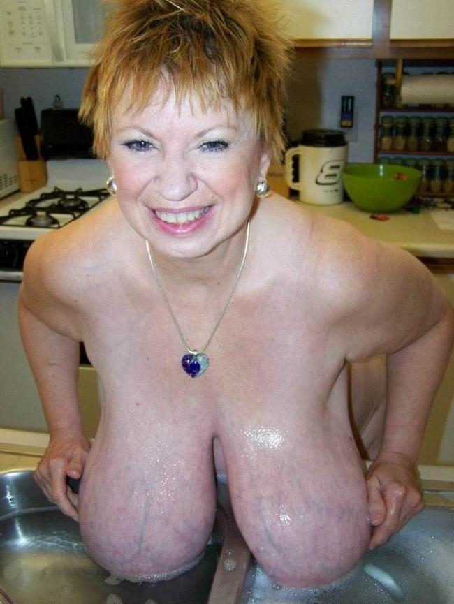 16P Amateur Granny Shows Her Huge Boobs