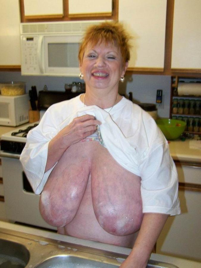 16P Amateur Granny Shows Her Huge Boobs