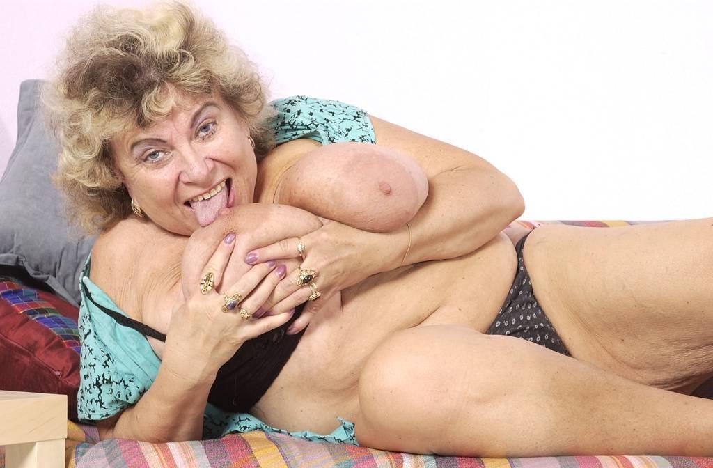 14P a kinky granny plays with her huge tits