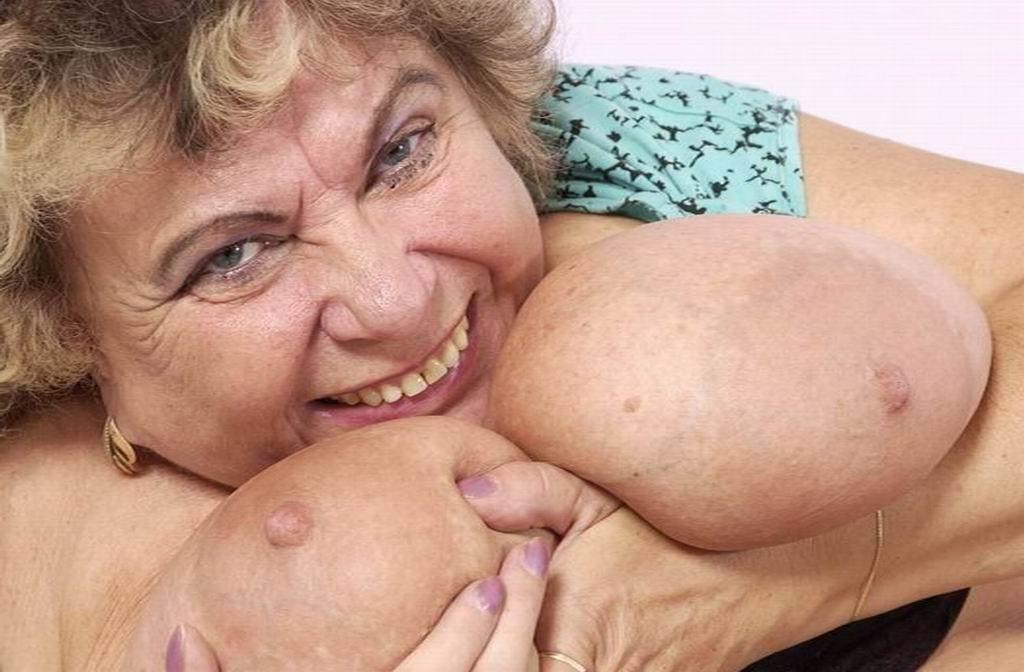 14P a kinky granny plays with her huge tits