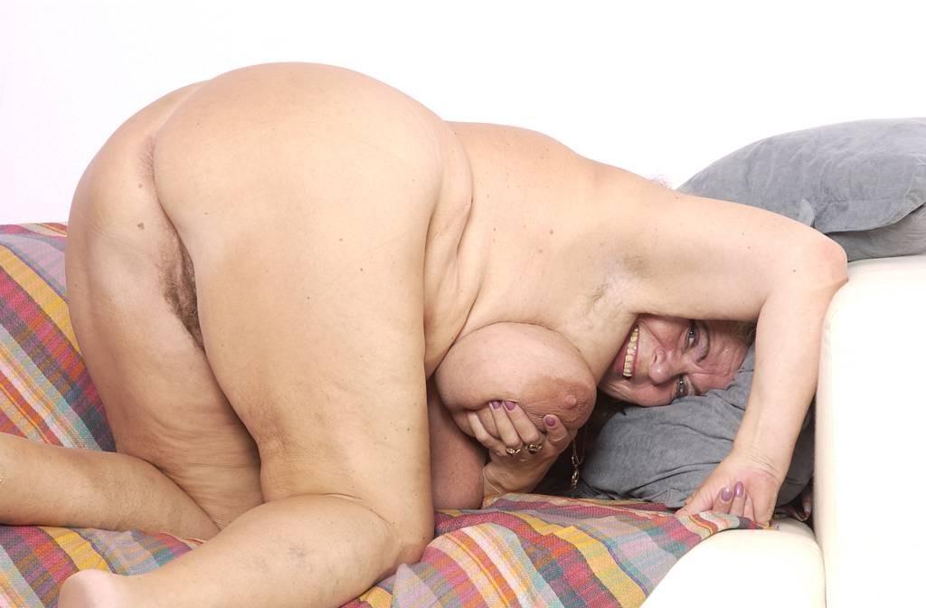 14P a kinky granny plays with her huge tits