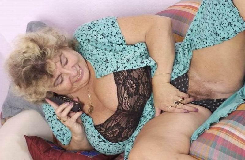 14P a kinky granny plays with her huge tits