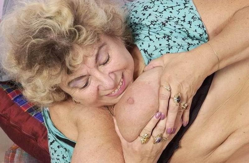 14P a kinky granny plays with her huge tits