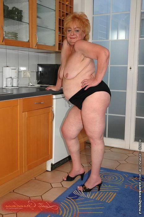 16P Slutty redhead granny getting a stiff young cock