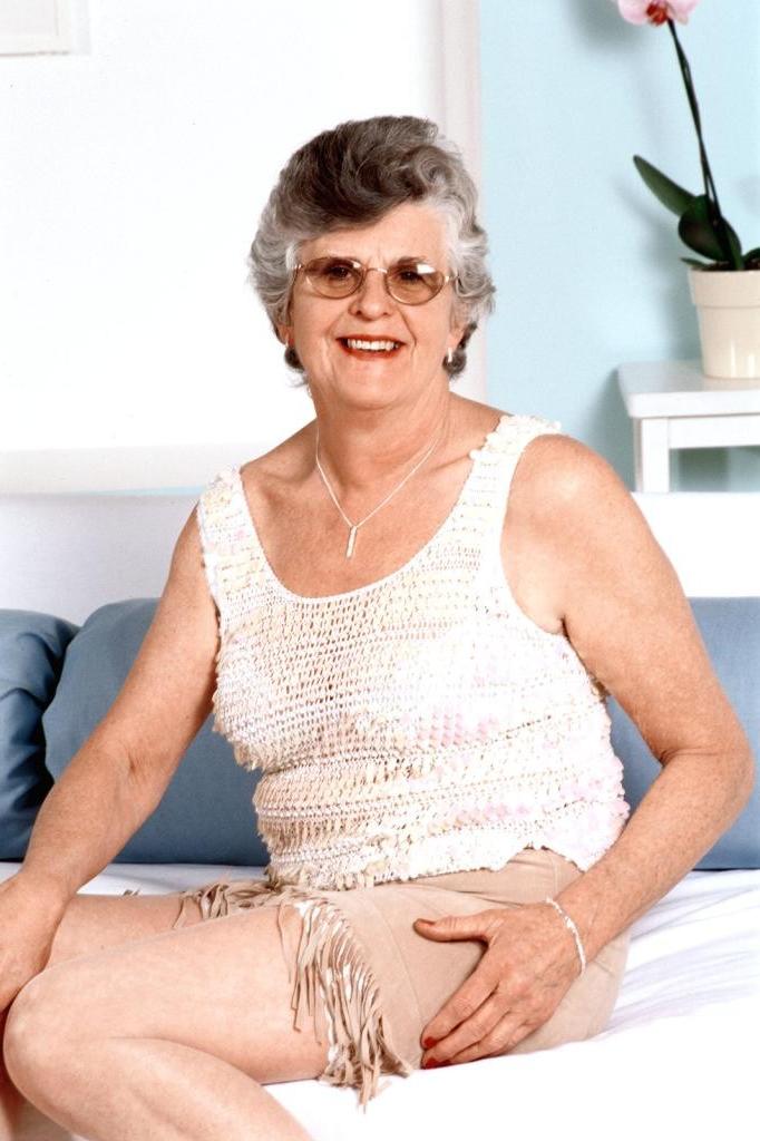 20P Granny in white stockings loves stuffing dildo in her twat