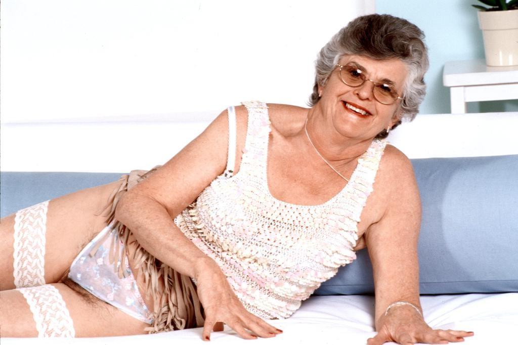 20P Teasing horny granny in white lingerie dildoing her pussy
