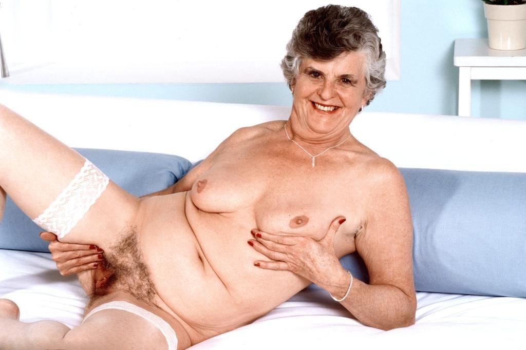 20P Teasing horny granny in white lingerie dildoing her pussy