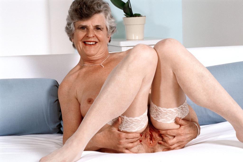20P Teasing horny granny in white lingerie dildoing her pussy