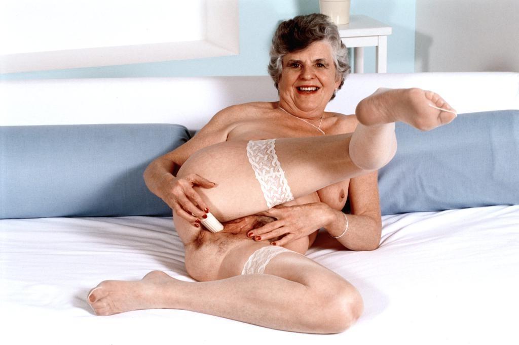 20P Teasing horny granny in white lingerie dildoing her pussy