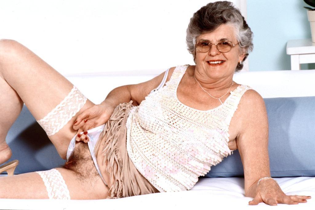 20P Teasing horny granny in white lingerie dildoing her pussy