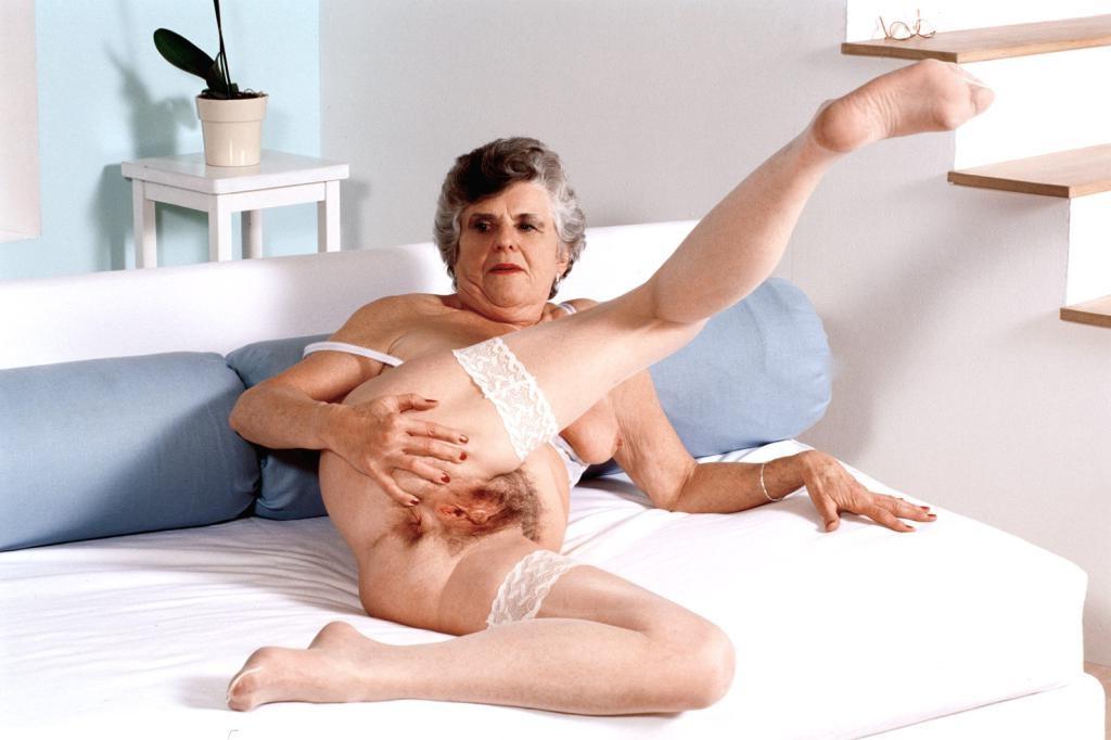 20P Teasing horny granny in white lingerie dildoing her pussy