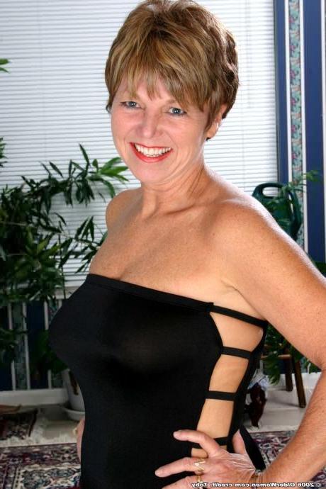 16P Big Tits Fiftyish Laughing Granny Enjoys Stripping Naked For You