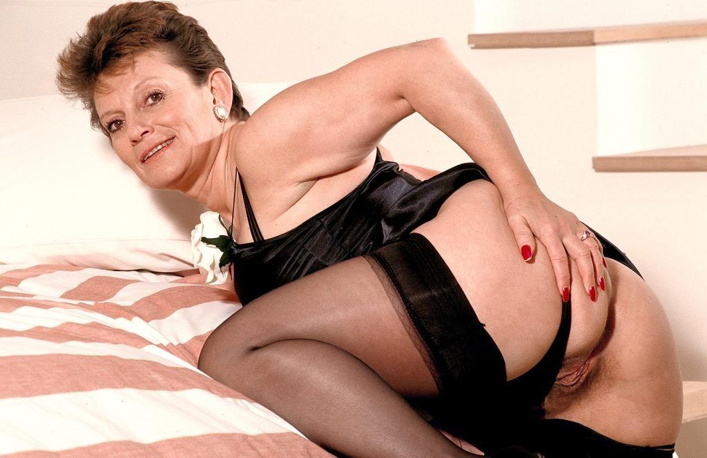 20P Horny granny in lingerie and stockings loves strip teasing