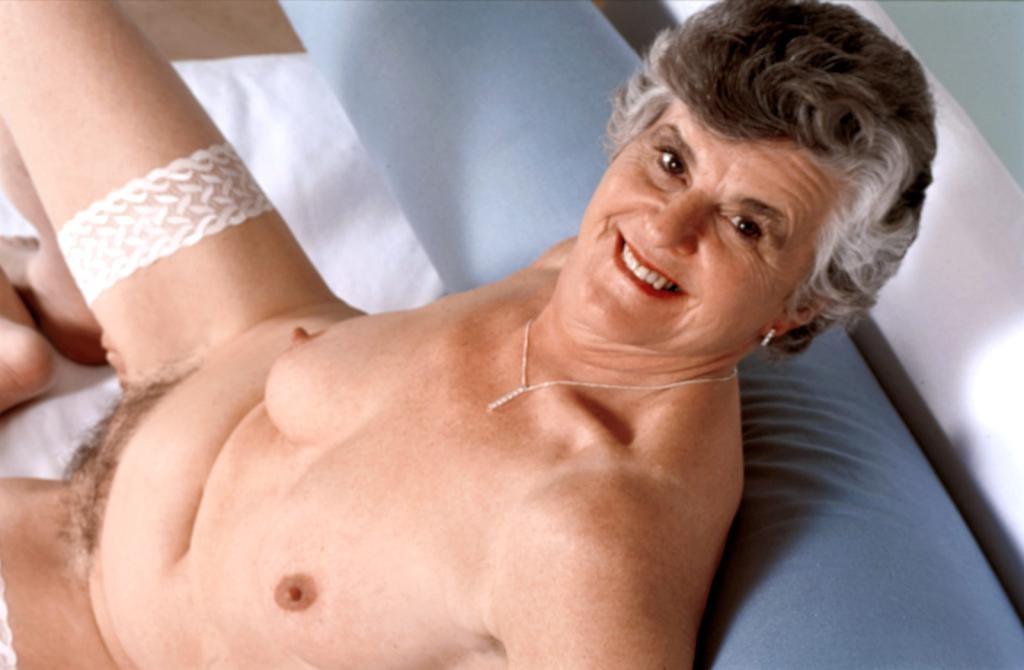 20P Horny granny in stockings spreading her hairy pussy