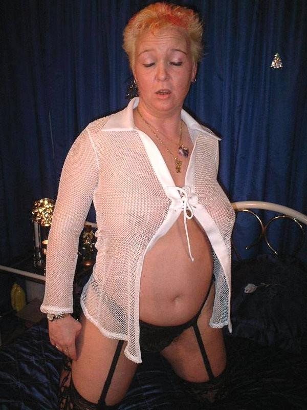 16P Horny granny in stockings plays with her natural big tits