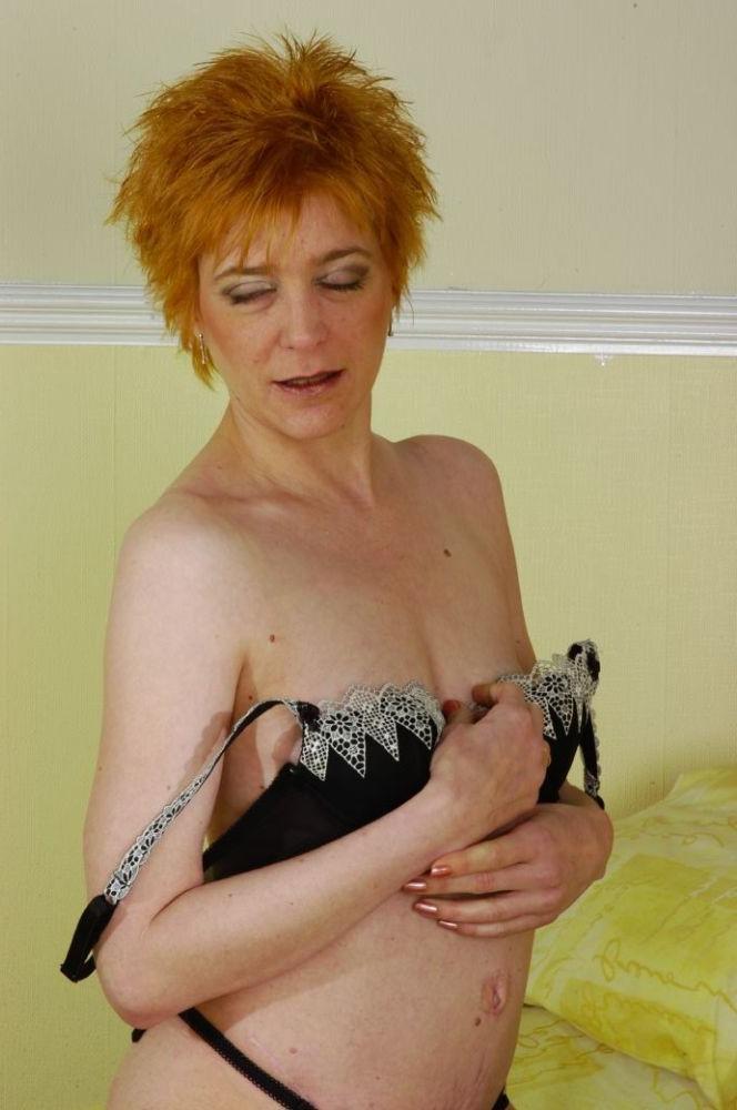 17P Redhead House Wife In Stockings Spreads Her Pink Snatch Lips
