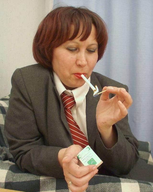 20P Horny busty mature loves strip teasing and rubbing her twat