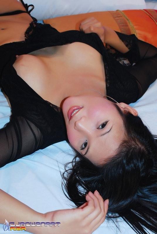 15P Asian Ladyboy Hottie In Fishnets Strokes Her Amazing Cock