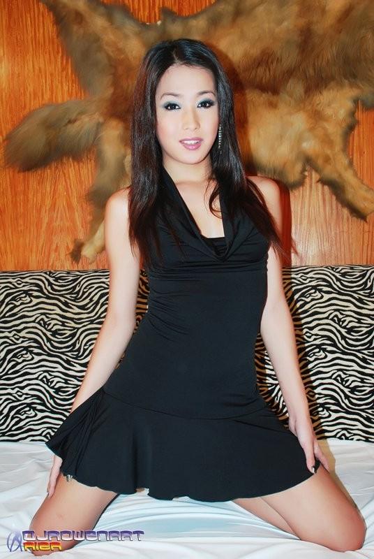 15P Petite And Cheeky Asian Ladyboy Shows Her Shaved Cock
