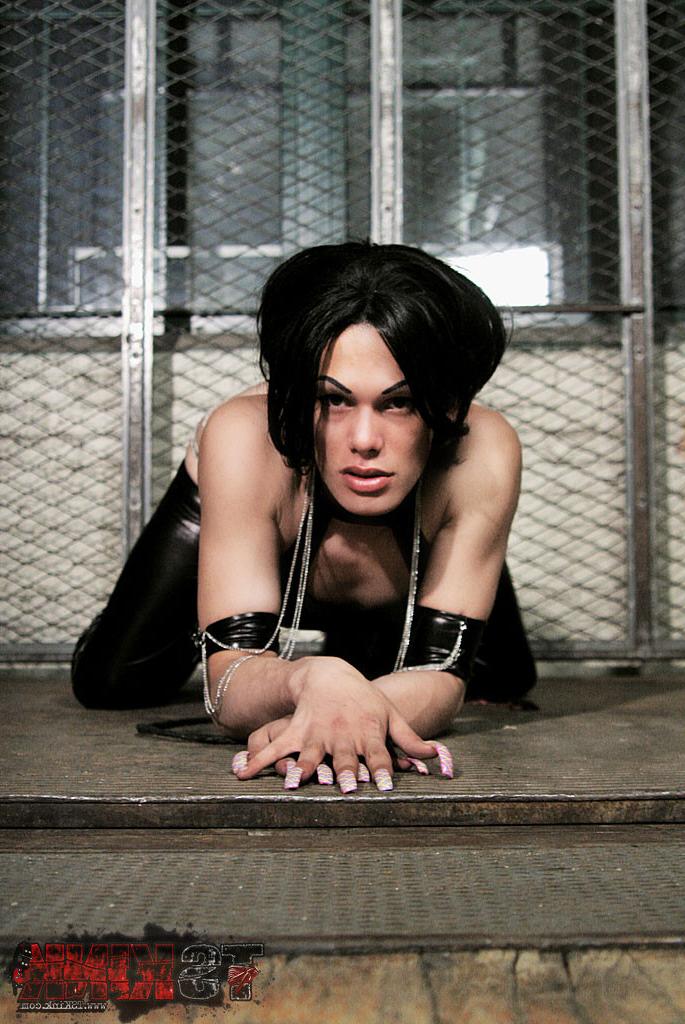 15P Brunette Shemale Foxi In Latex And Chains
