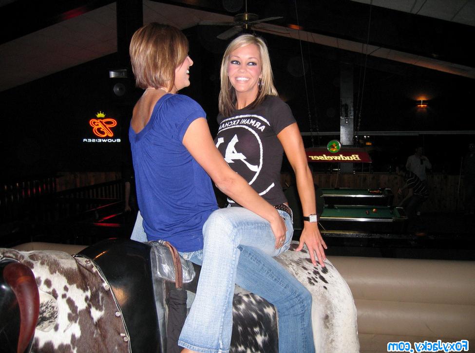16P Melissa and Jacky riding on the mechanical bull together
