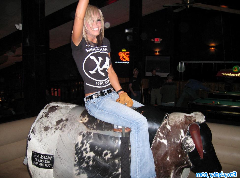 16P Melissa and Jacky riding on the mechanical bull together
