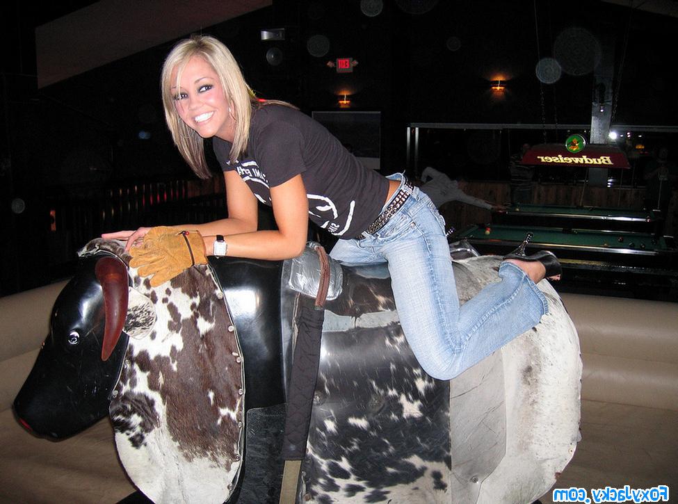 16P Melissa and Jacky riding on the mechanical bull together