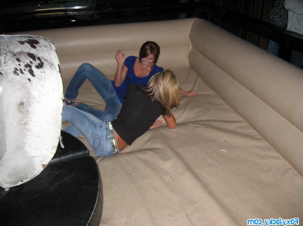 16P Melissa and Jacky riding on the mechanical bull together